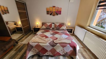 Family Apartment, Garden View | 2 bedrooms, blackout curtains, iron/ironing board, free WiFi