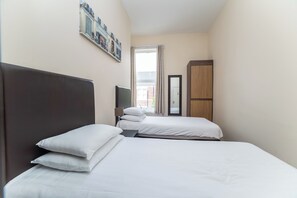 4 habitaciones, tabla de planchar con plancha y wifi gratis 