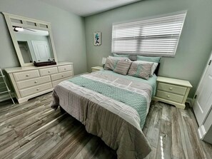 1 bedroom, desk, iron/ironing board, travel crib