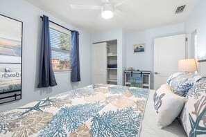 1 bedroom, desk, iron/ironing board, travel crib