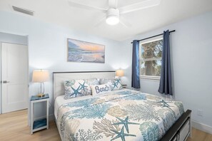 1 bedroom, desk, iron/ironing board, travel crib