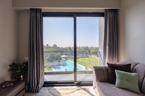 Deluxe Double Room, Pool View | Laptop workspace, soundproofing, free WiFi - Saavi Suites (Daman)
