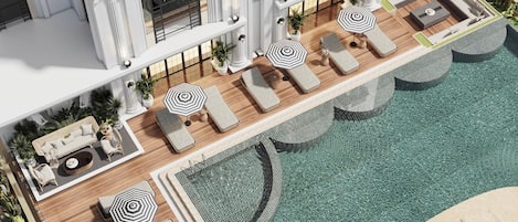 Piscine extérieure, parasols de plage, chaises longues