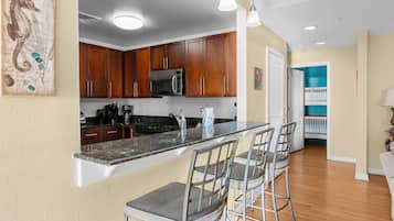 Microwave, dishwasher, cookware/dishes/utensils