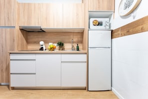 Fridge, microwave, coffee/tea maker, electric kettle