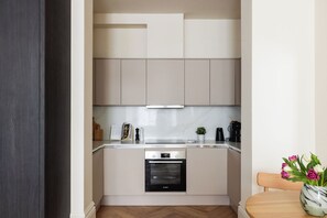 Superior Studio | Private kitchen | Fridge, microwave, oven, stovetop