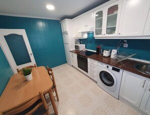 Leilighet, 2 soverom, byutsikt | Klesvask