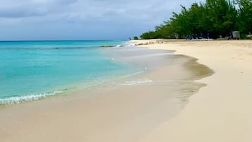 On the beach, sun-loungers, beach towels