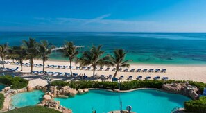 On the beach, sun loungers, beach towels