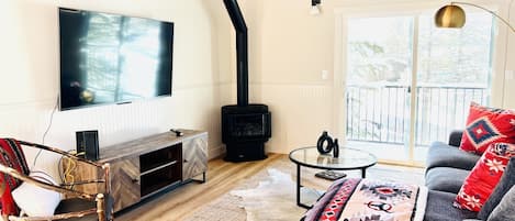 Smart TV, fireplace, table football, books