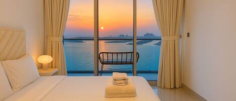 Apartamento de lujo, vistas a la playa | 2 dormitorios, tabla de planchar con plancha, wifi gratis