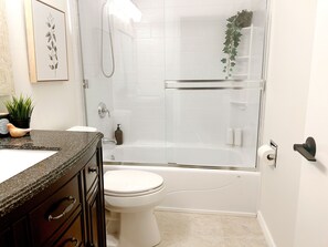 Hair dryer, towels, soap, toilet paper