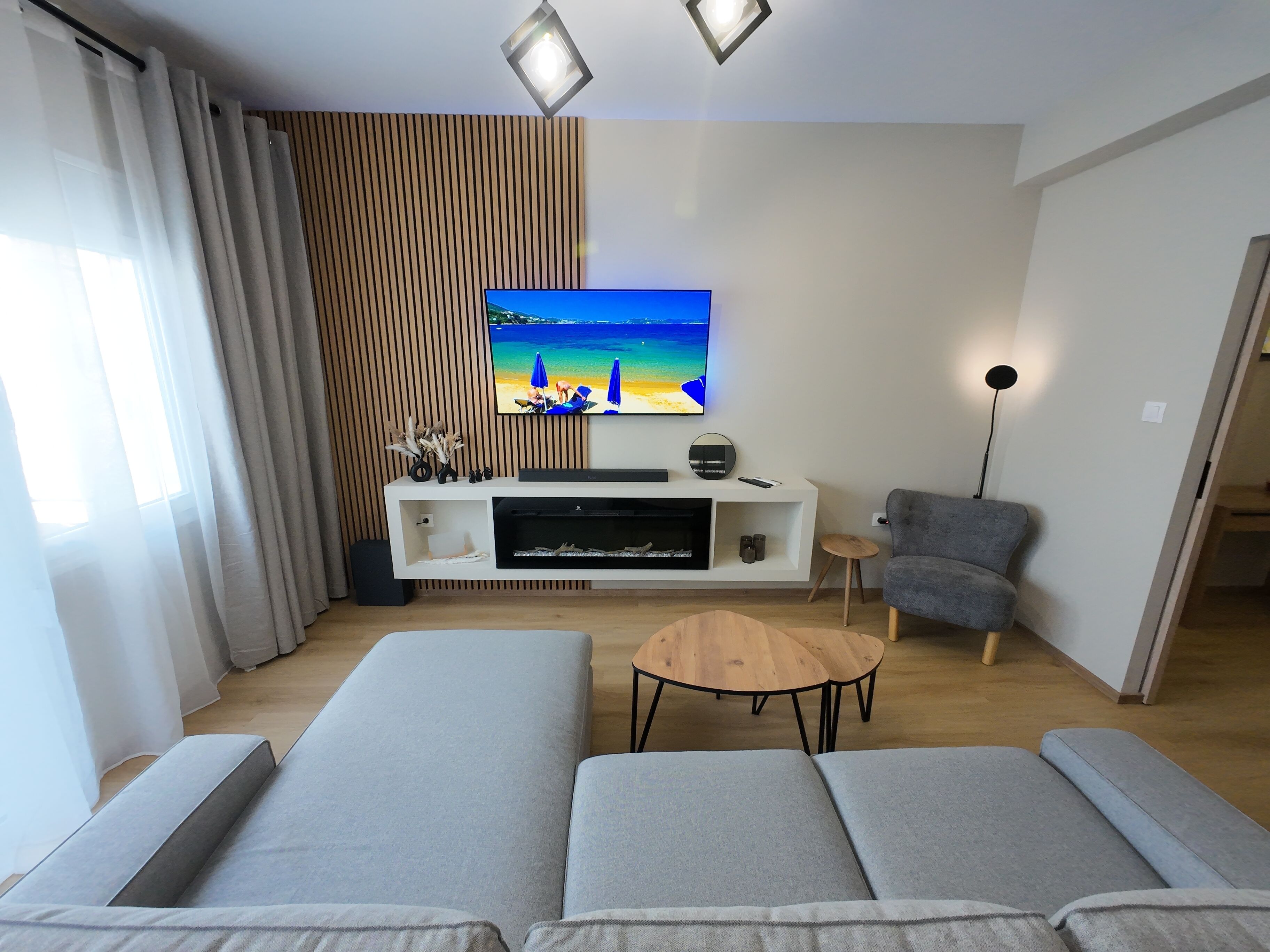 Apartment, Non Smoking, Balcony | Living area | 55-inch LED TV with digital channels