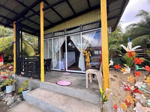 Charming 3-bedroom resort with WiFi, AC in peaceful Surigao Del Sur privatebeach