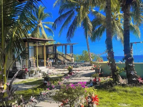 Charming 3-bedroom resort with WiFi, AC in peaceful Surigao Del Sur privatebeach