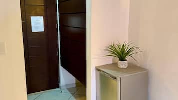 Suite Deluxe, 1 cama King size, balcón, vista a la ciudad | 1 habitación y wifi gratis