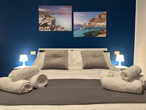 2 habitaciones, tabla de planchar con plancha, wifi y ropa de cama 