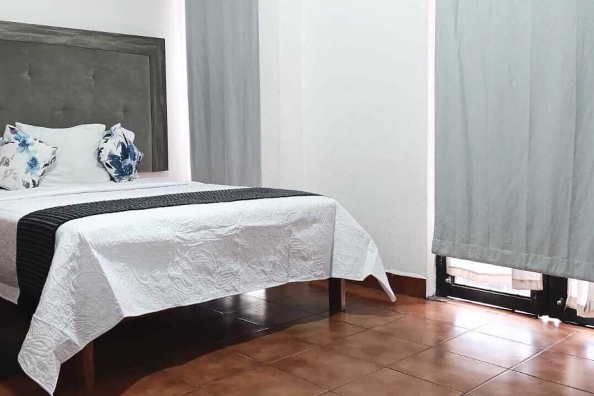 Habitación doble familiar, 2 camas Queen size | 1 habitación, edredón, wifi gratis y ropa de cama