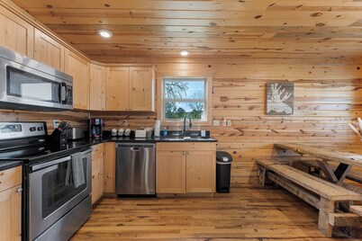 Pet-Friendly Peaceful Cabin Near River w/ Fire Pit + Hot Tub Sleeps 14