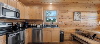 Pet-Friendly Peaceful Cabin Near River w/ Fire Pit + Hot Tub Sleeps 14