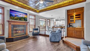 Smart TV, chimenea, videojuegos, futbolito