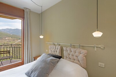 Apartamento 'Vall' con vistas a la montaña, jardín compartido y Wi-Fi