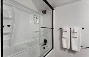 Hair dryer, towels, soap, shampoo