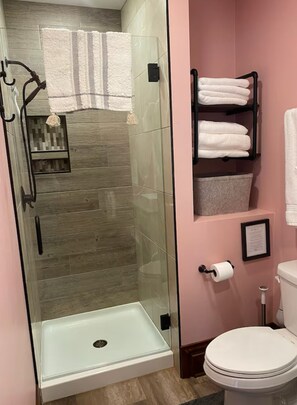 Shower, hair dryer, towels, soap