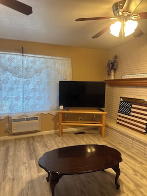 Basic Apartment, 3 Bedrooms, Non Smoking | Living area | TV - The Fossil Butte Motel (Kemmerer)