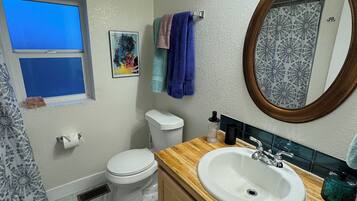 Shower, hair dryer, towels, soap