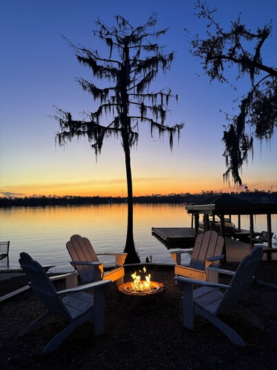 Welcome to our home! Lakefront Living, Where Beautiful Sunsets are unforgettable