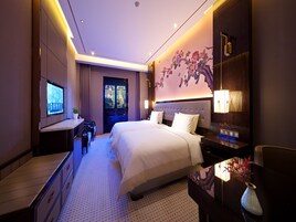 Premium bedding, down comforters, pillowtop beds, in-room safe