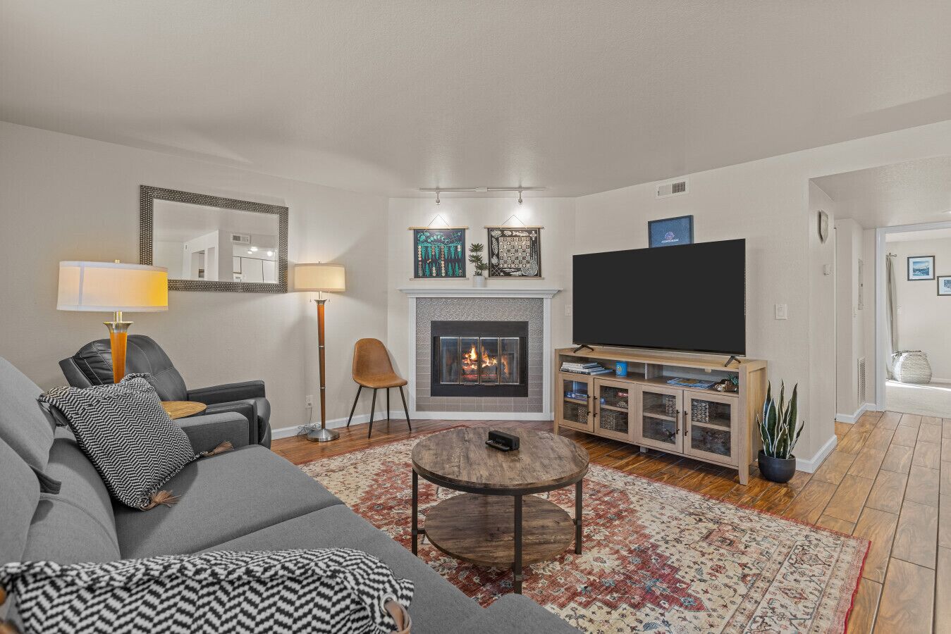 Smart TV, fireplace, foosball, books