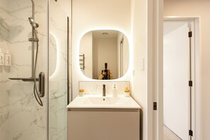 Hair dryer, bidet, towels, soap