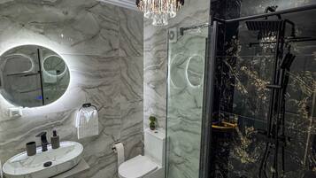 Shower, hair dryer, towels, soap