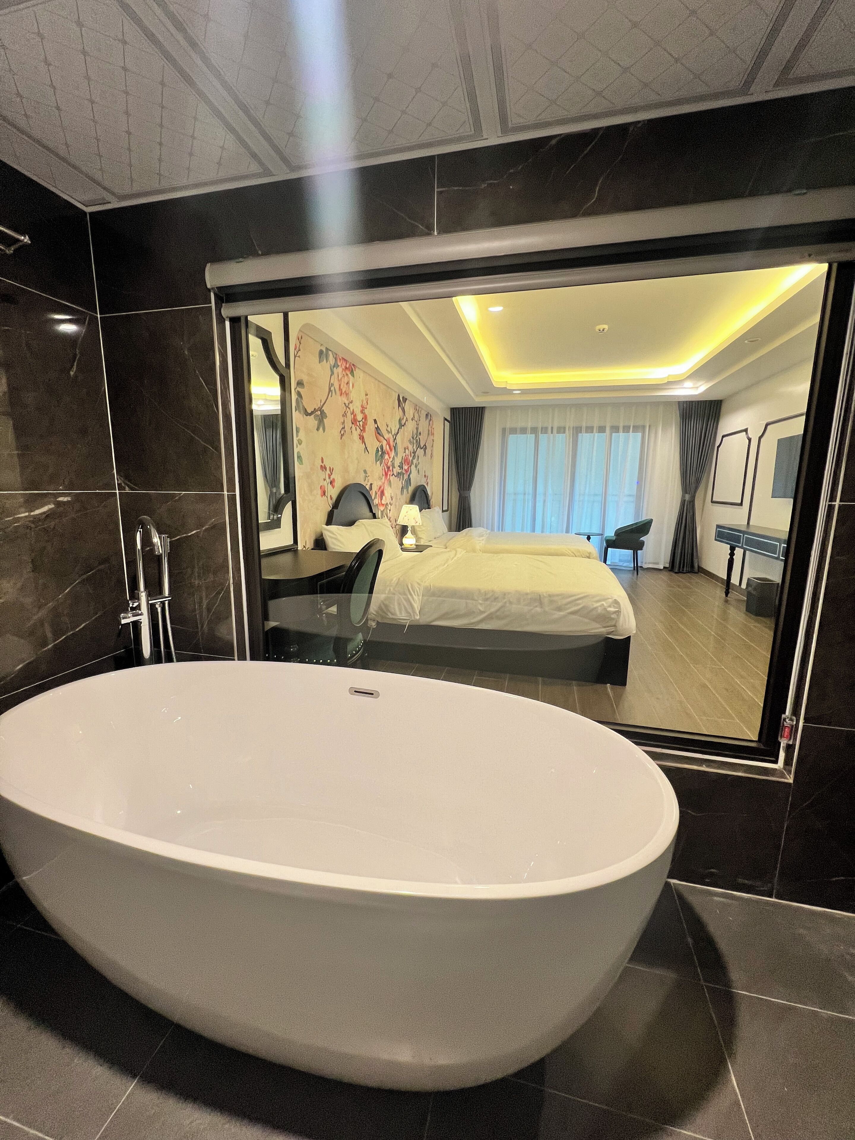 Premier Twin Room, Balcony, Garden View | Bathroom | Hair dryer, slippers, towels, soap