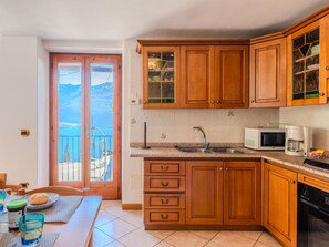 Fridge, microwave, oven, cookware/dishes/utensils