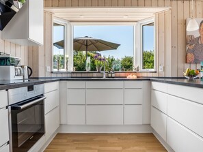 Fridge, microwave, dishwasher, cookware/dishes/utensils