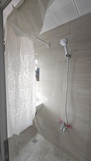 Economy Double Room, City View | Bathroom | Shower, towels, toilet paper