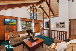Signature Cabin, 2 Bedrooms, Fireplace, Mountainside | Living room | 49-inch Smart TV with digital channels, fireplace