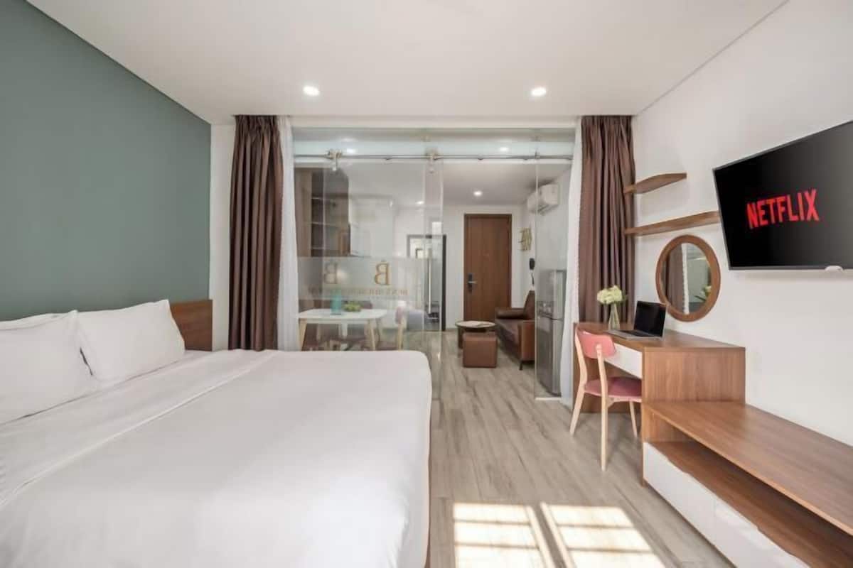 Minibar, desk, blackout curtains, iron/ironing board