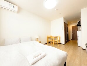 Kahden hengen deluxe-huone, tupakointi kielletty, keittotila | Ilmainen Wi-Fi, vuodevaatteet