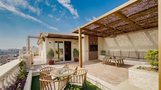 Basic Apartment | Outdoor dining - Xuru Stays I The 1bdr Rustic Rooftop w/ Wow Outdoor Terrace (Cairo)