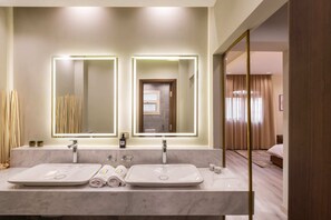 A modern bathroom with two sinks, a large mirror, and a well-lit vanity area. - Xuru Stays I The Sleek & Ritzy 2 BDR 15 min From CAI Airpt (New Cairo)
