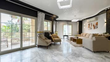 Basic Apartment (Serene & Spacey) | Living area | TV