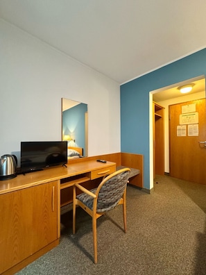 Desk, laptop workspace, free WiFi, bed sheets