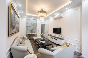 Appartement, balcon, vue ville | 1 chambre, bureau, fer et planche Ă repasser, Wi-Fi gratuit