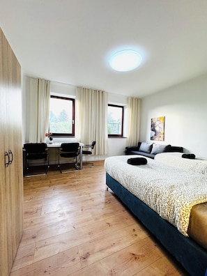 Basic Room | Blackout drapes, iron/ironing board