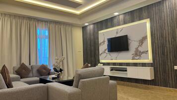Deluxe Apartment, 2 Bedrooms | 2 bedrooms, in-room safe, blackout drapes, iron/ironing board