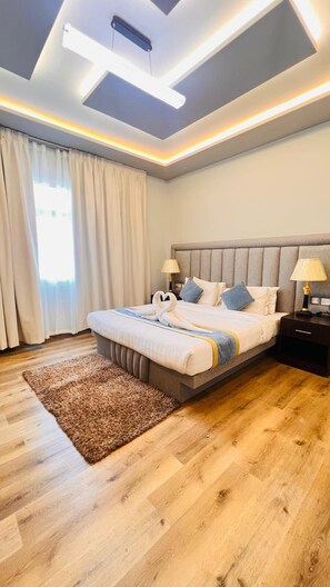 Deluxe Apartment, 2 Bedrooms | 2 bedrooms, in-room safe, blackout drapes, iron/ironing board - Amber Tower  (Manama)